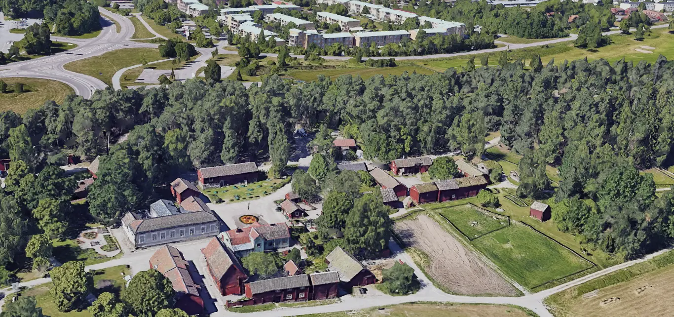 Flygbild över Vallby friluftsmuseum. 