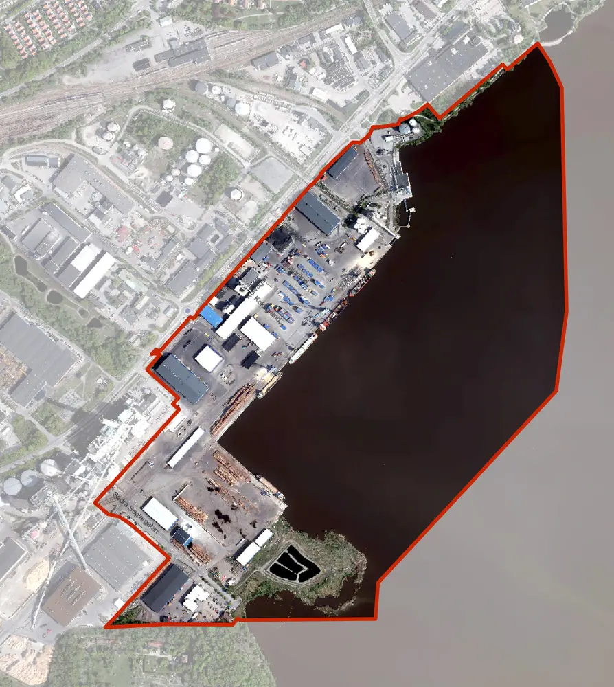 Flygbild över hamnen med planområdet markerat med röd linje